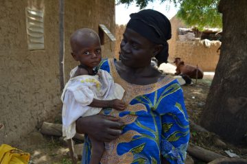 Adama and her daughter in August 2012, when Eduwa* was suffering from malnutrition. ©CARE