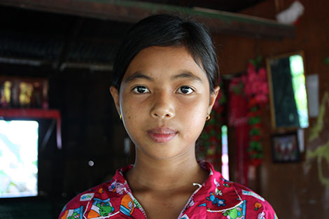 Bopha misses school because she is burdened by collecting water and helping run her household.