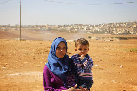 Sahab, 24, Syrian refugee mother in a tented settlement close to Amman: “I wish my children could grow up safe, sound and healthy. I am pregnant, but I wish I did not have to give birth to my child as a refugee. I wish I was able to raise my children in a place that I call home.”