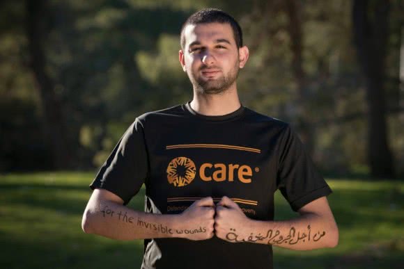 Saif and his reason to run the Dead2Red marathon. ©CARE/Wolfgang Gressmann