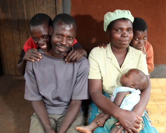 Fortunate is a member of CARE's Village Savings and Loans group in Malawi. She is learning to save and invest her money to earn a greater income. Image: Josh Estey/CARE. 