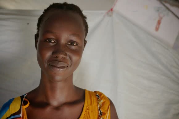 “My life is not the same as my mother’s. She was completely dependent on her husband. With education, I can take decisions and earn some small money” - Angelina. Photo: Tom Perry/CARE