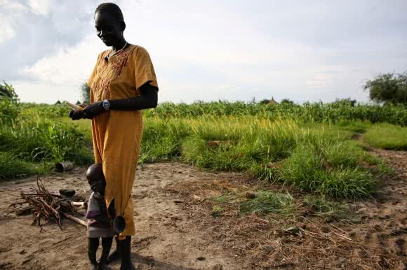 “A woman in South Sudan undergoes difficult times but she still keeps the hope that one day things will be alright. She is a woman of peace and always wants to see that her family and her country are at peace but her voice is not being heard" - Nyarone. Photo: Josh Estey/CARE