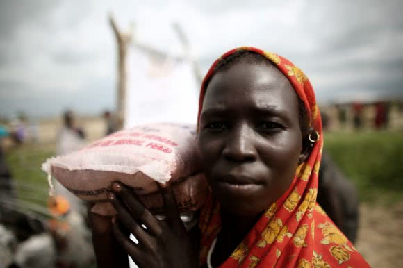 “You asked me where my husband is. He is in Juba, with another wife. If I depend on my husband, my children will have nothing to eat” - Nyanweng. Photo: Josh Estey/CARE