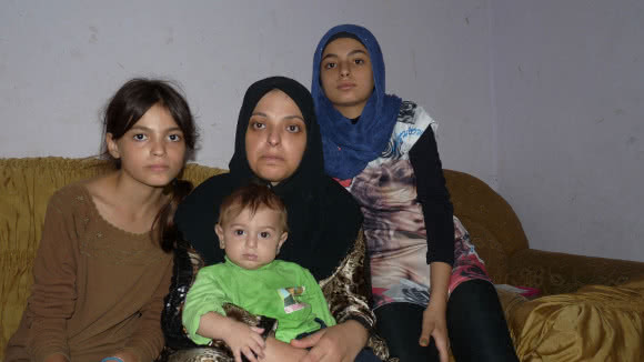 CARE helped repair Sanaa's bathroom and kitchen