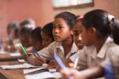 Timorese girls learning at school.