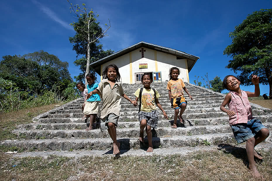 Girls running and playing in Timor Leste