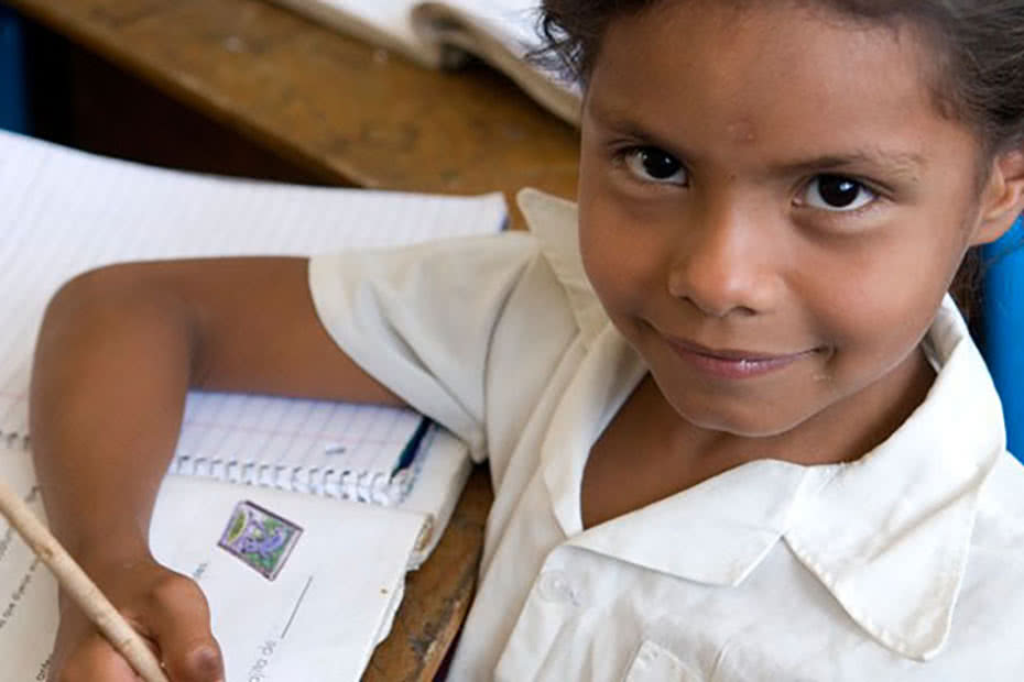 Seven-year-old Anna Maria from Nicaragua in her school classroom.