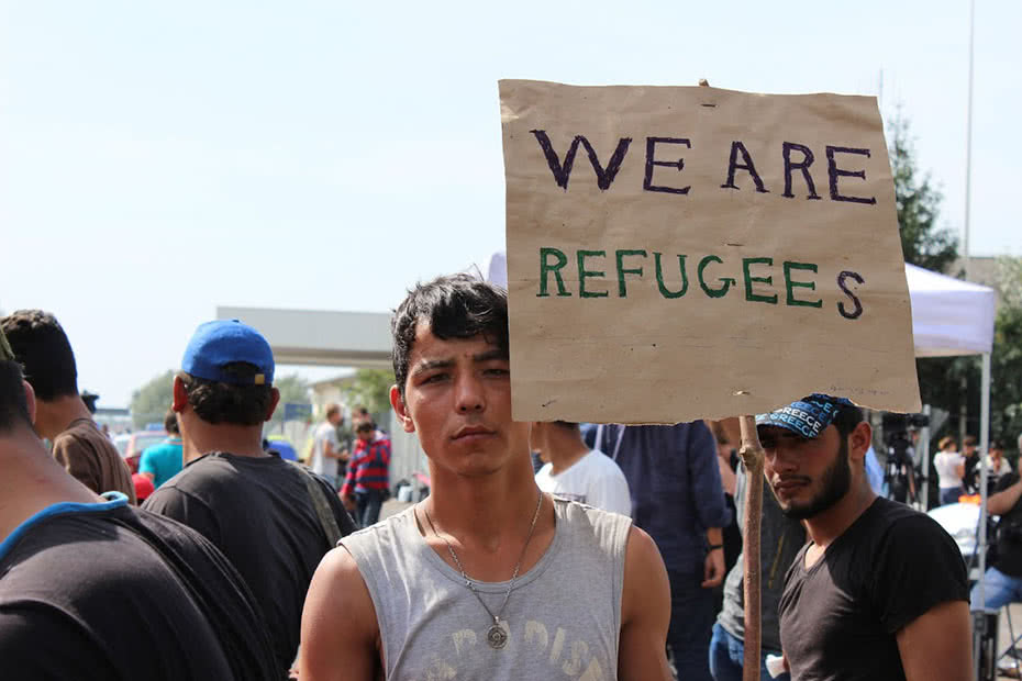 A boy declares his refugee status at the Serbian border.