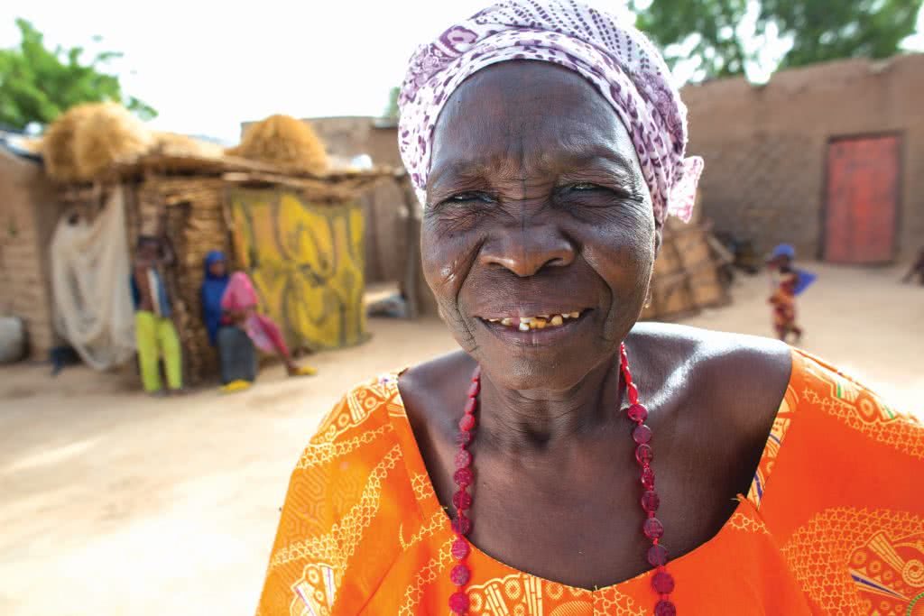 Fatchima Aboubacar poses for a picture. Fatchima is a member of the first VSLA in 1991 (Mata Masu Dubara) who says that MMD has created peace where there was once constant fighting among husbands and wives, families and neighbors. “Everyone had a black heart,” she said, "because no jobs meant no money – and that meant little food." Since she joined MMD, she has become an entrepreneur, making and selling peanut oil, and providing natural remedies with herbs. She says, with a wink, that her most popular product has been a homemade aphrodisiac. She also has moved from a straw hat to a semi-mud hut with metal roof, paid for her children’s weddings, educated most of them and made a 90-day pilgrimage to Mecca, which she says fulfills her as a Muslim.