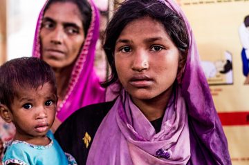 Hamida and her baby sister, Bushra fled the violence in Myanmar and now live in a refugee camp in Bangladesh. Image © Kathleen Prior.